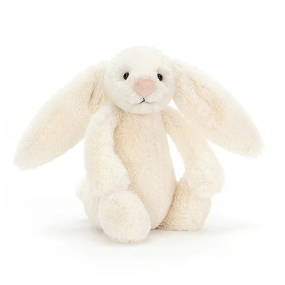 White stuffed rabbit sitting
