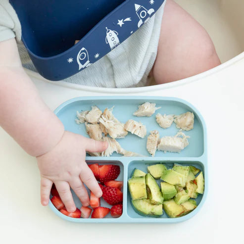 Bella Tunno Shooting Star Learn to Eat Beginner Bundle includes a suction plate, bowl, utensils, and cup for easy baby mealtime transition with food-safe silicone design.