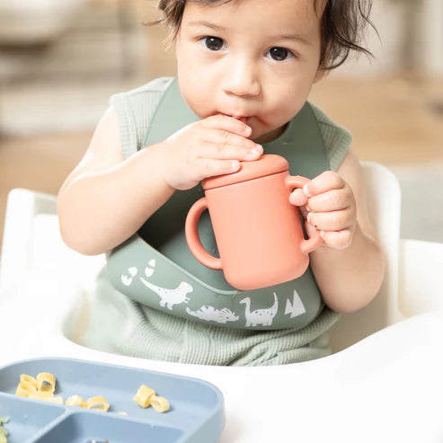 Bella Tunno Jungle Safari Learn to Eat Beginner Bundle with a suction plate, bowl, utensils, and cup for easy baby mealtime transition with food-safe silicone design.