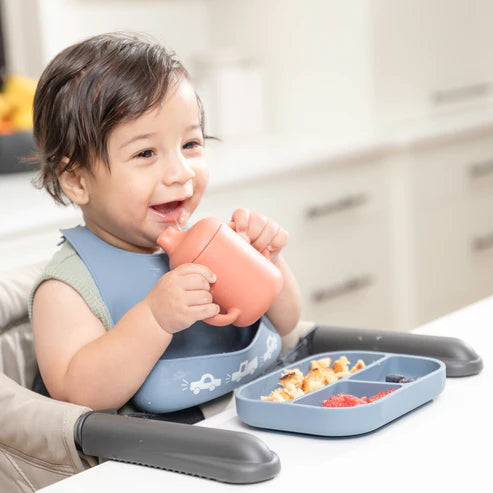 Bella Tunno Jungle Safari Learn to Eat Beginner Bundle with a suction plate, bowl, utensils, and cup for easy baby mealtime transition with food-safe silicone design.