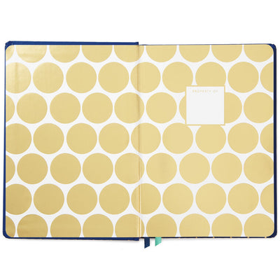 Navy blue hardback notebook with gold foil Oscar Wilde quote, mini gold polka dots, elastic band closure, two ribbon bookmarks, dot grid pages, Hallmark
