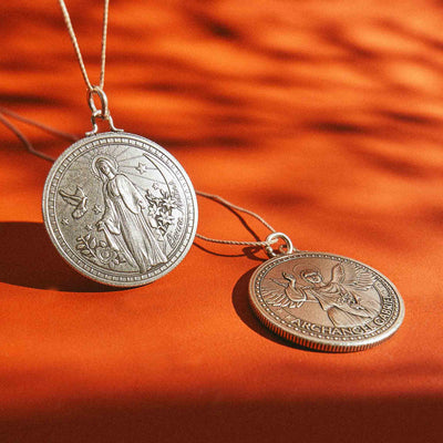 Double pendant necklace: silver Virgin Mary and pearl bird.Archangel Gabriel Medallion Necklace