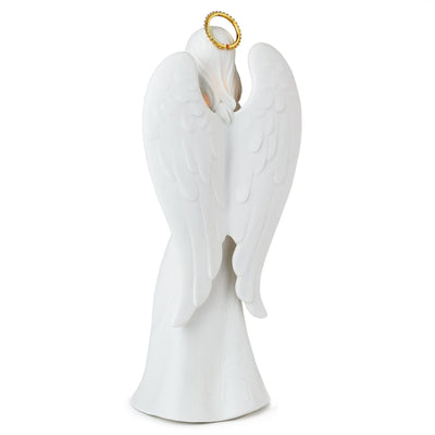 Tall ceramic angel figurine with light-up lantern, gold accents, and Blessed beyond measure inscription.
