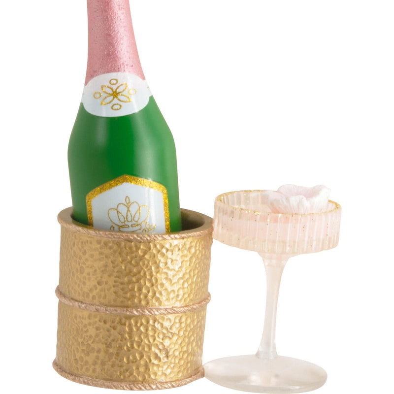 Hallmark ornament with champagne bottle in gold chiller and coupe glass
