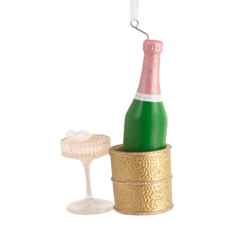 Hallmark ornament with champagne bottle in gold chiller and coupe glass

