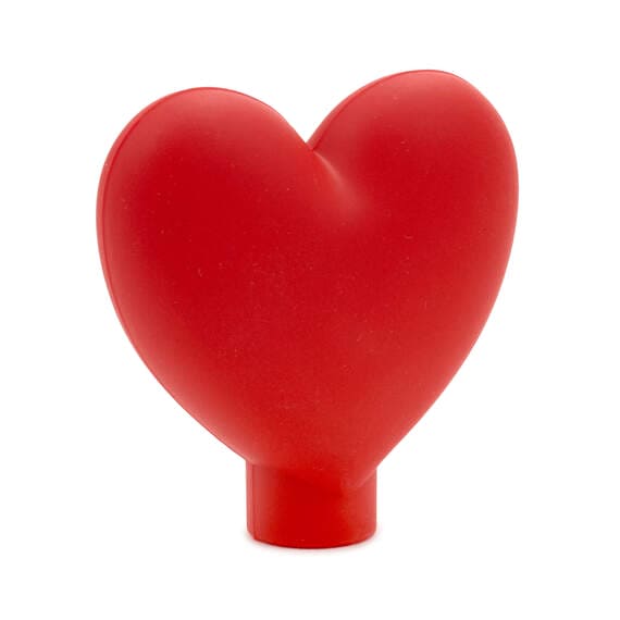 Red heart on a white background. The heart has a smooth, flat surface and a glossy finish.  pen_spark     tune  share   more_vert