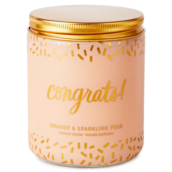 Festive Hallmark single-wick candle with orange and pear scent, coral confetti design, and “Congrats!” message.

