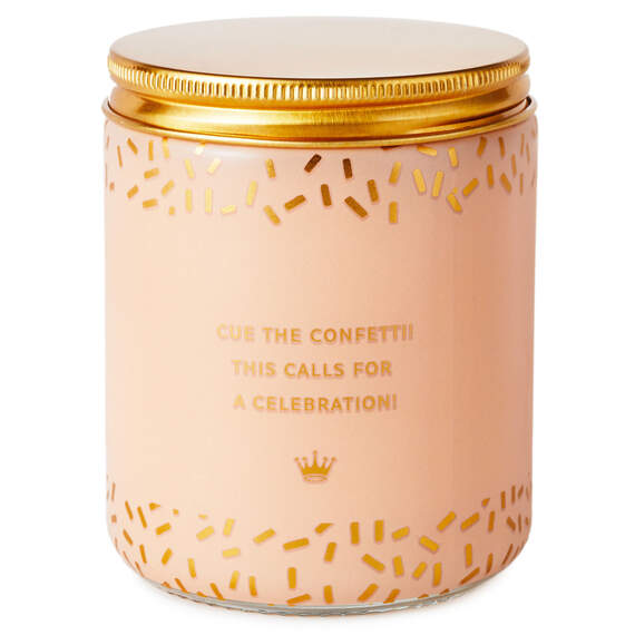 Festive Hallmark single-wick candle with orange and pear scent, coral confetti design, and “Congrats!” message.

