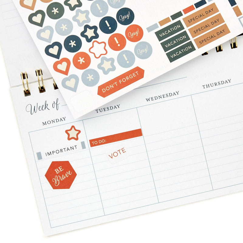 Spiral-bound weekly calendar with uplifting “This Is the Day” scripture theme and floral design for desk or tabletop use.

