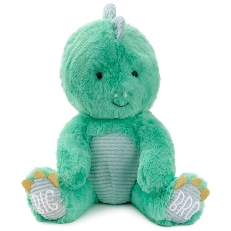 Big Brother dinosaur plush in bright green with blue corduroy accents and “Big Bro” stitched on its feet