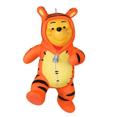 Winnie the Pooh ornament dressed in a striped orange Tigger costume with hood and bouncing pose