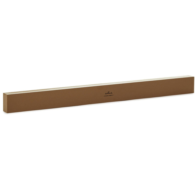 Hallmark dark wood quote sign with white lettering: Don’t just have a good day. Make one.
