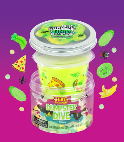 Crazy Aaron’s green Dumpster Dive slime with fun food scrap, bug, and crystal charms for squishy, stretchy sensory play. 