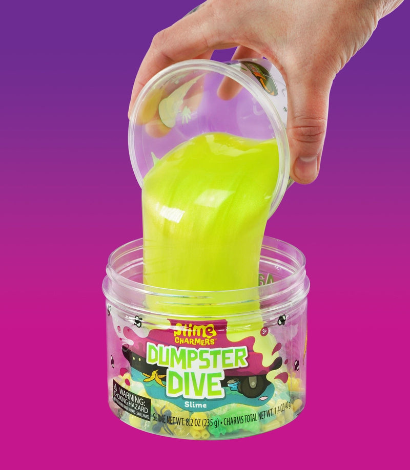 Crazy Aaron’s green Dumpster Dive slime with fun food scrap, bug, and crystal charms for squishy, stretchy sensory play. 