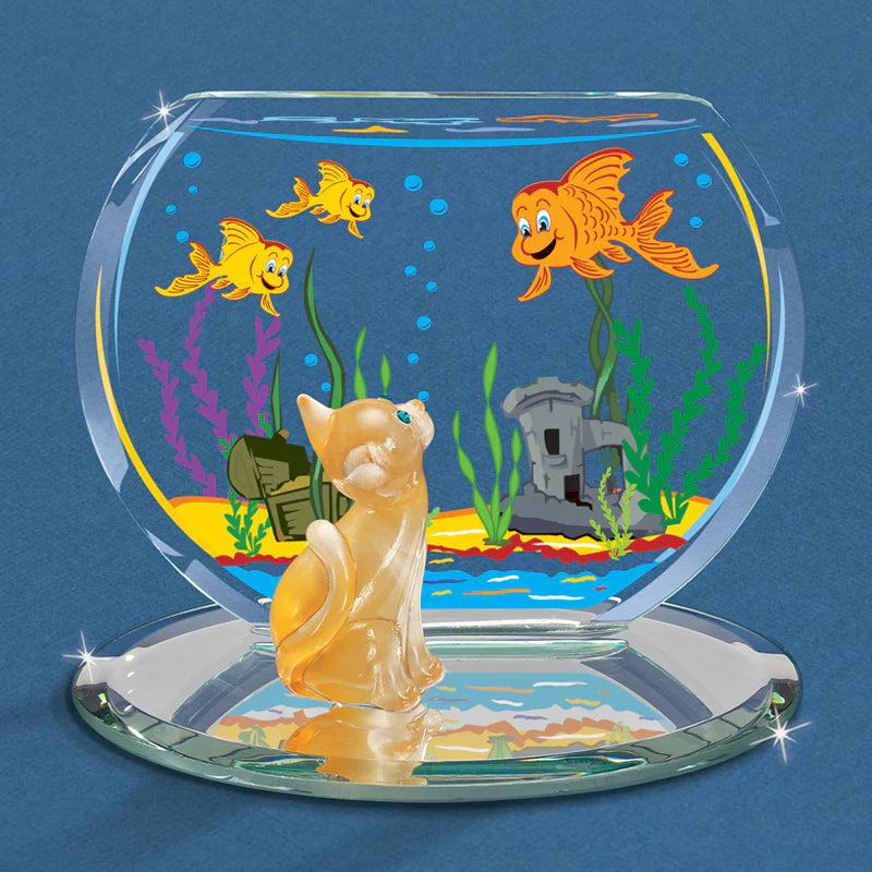 Handcrafted orange tabby cat figurine placed on a hand beveled glass mirror with decorative fish bowl shaped back plate