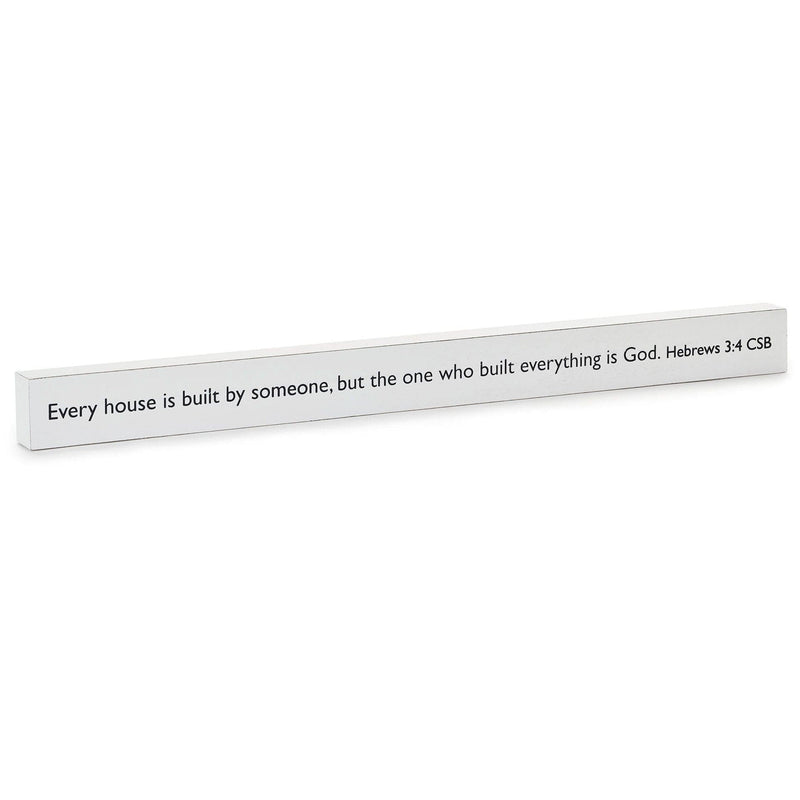 White weathered wood sign with Hebrews Scripture quote The one who built everything is God, farmhouse style.

