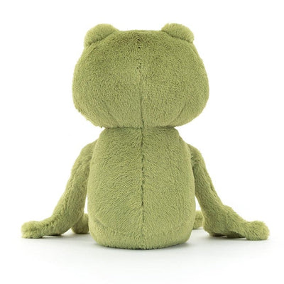 Stuffed frog on white surface