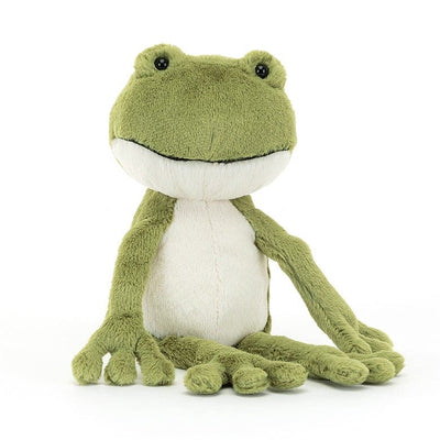 Stuffed frog on white surface