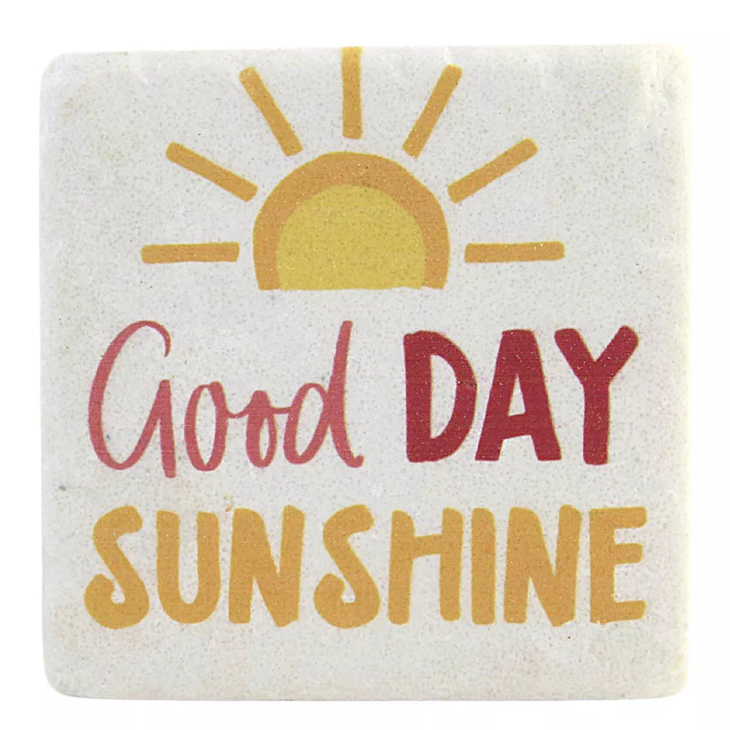A set of four off-white coasters, each with a different sun design and cheerful quote like "You Are My Sunshine".

