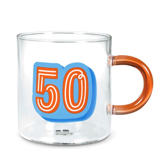 Hallmark glass coffee mug with bold orange and blue “50” design and orange-tinted handle, perfect for a 50th birthday gift.

