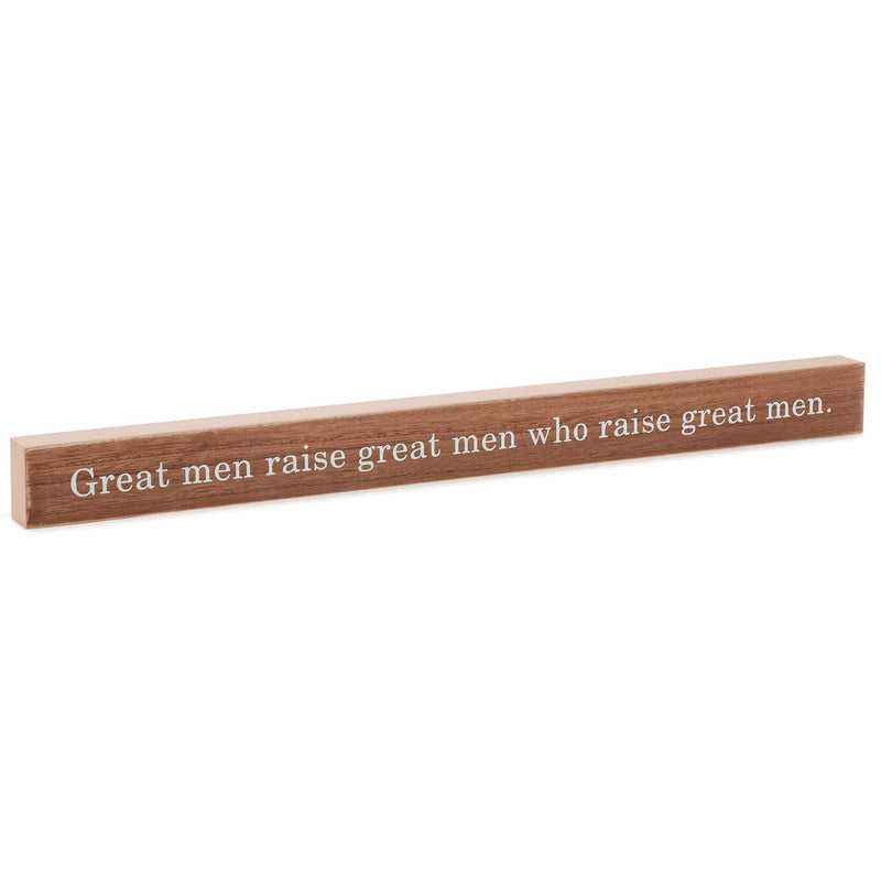 Hallmark wood sign with white quote text: “Great men raise great men” on medium-tone stained background