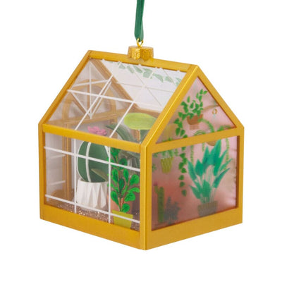 Hallmark greenhouse ornament with potted plants and gold floor

