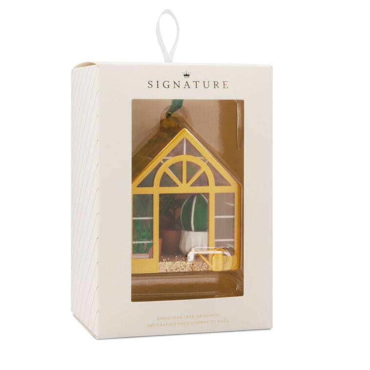 Hallmark greenhouse ornament with potted plants and gold floor
