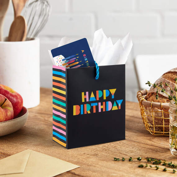 Mini black birthday gift bag with colorful "Happy Birthday" lettering, twisted cord handle, perfect for gift cards or small 

