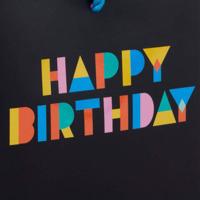 Mini black birthday gift bag with colorful "Happy Birthday" lettering, twisted cord handle, perfect for gift cards or small 
