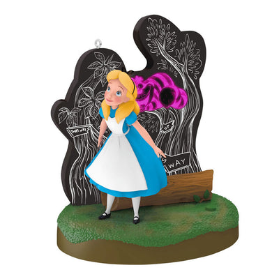 Alice stands in Wonderland before a glowing tree as the Cheshire Cat fades in and out in this Hallmark Keepsake Disney ornament.