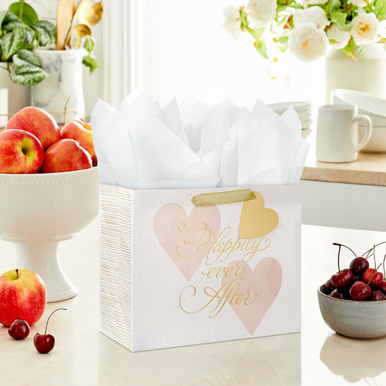 Hallmark medium white gift bag with pink watercolor hearts and gold foil “Happily Ever After” text, ideal for weddings or anniversaries.