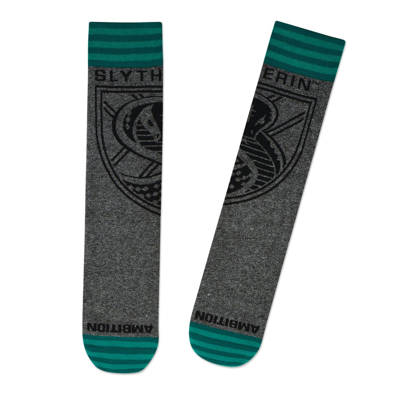Hallmark Slytherin crew socks with gray marled base and green crest and accents, laid flat side by side.