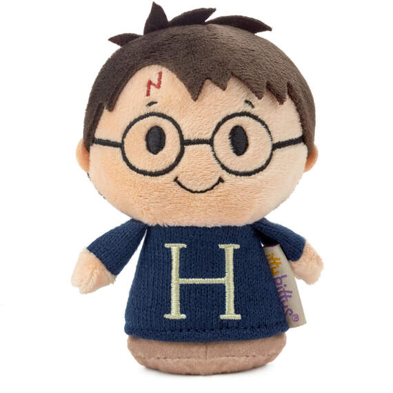 Harry Potter plush in blue sweater with "H" on it, round glasses, and messy hair.

