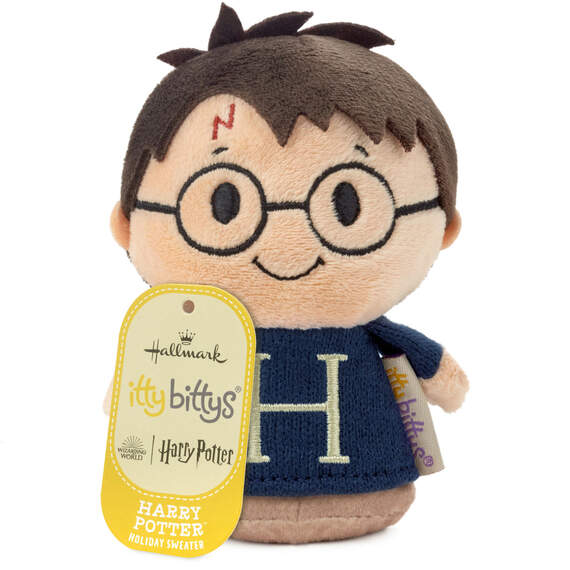 Harry Potter plush in blue sweater with "H" on it, round glasses, and messy hair.

