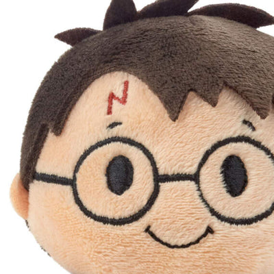 Harry Potter plush in blue sweater with "H" on it, round glasses, and messy hair.

