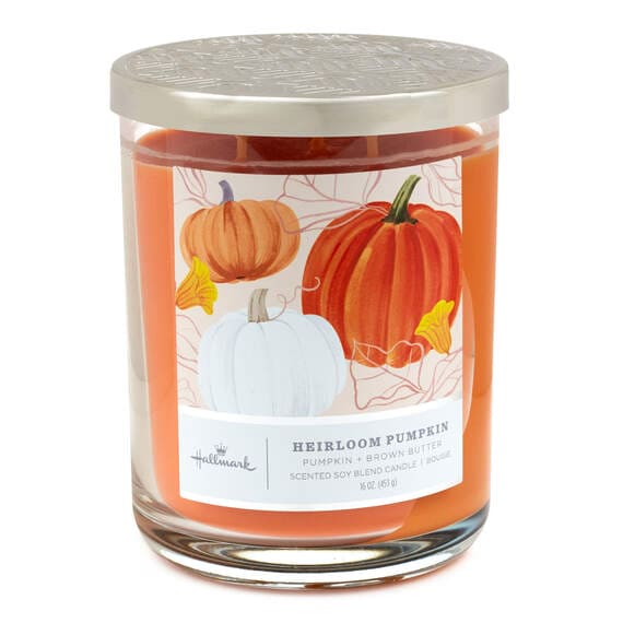 Three-wick Hallmark candle in glass jar with pumpkin and brown butter scent, perfect for cozy fall home décor.

