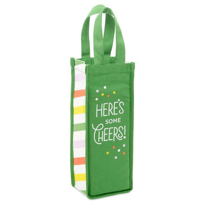 Hallmark green canvas wine bag with colorful polka dots, striped gussets, and "Here's some cheers!" message for parties.

