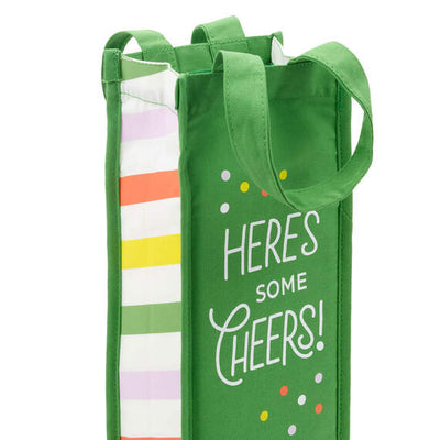 Hallmark green canvas wine bag with colorful polka dots, striped gussets, and "Here's some cheers!" message for parties.

