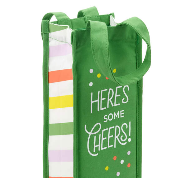 Hallmark green canvas wine bag with colorful polka dots, striped gussets, and "Here&