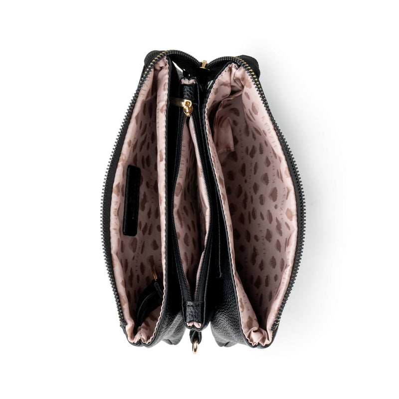 Pink Kedzie Eclipse Crossbody with wristlet and crossbody straps, three zip pockets, and built-in card slots.

