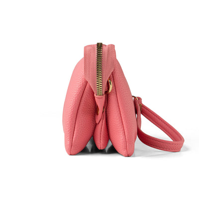 Pink Kedzie Eclipse Crossbody with wristlet and crossbody straps, three zip pockets, and built-in card slots.


