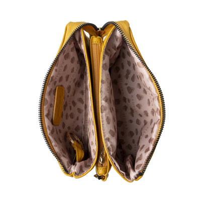 Yellow Kedzie Eclipse Crossbody with three zip compartments, card slots, key leash, and wristlet strap.

