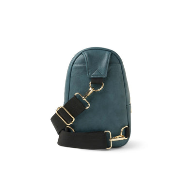 Teal Kedzie Sunset Sling Bag with gold-tone zippers, cheetah print lining, and adjustable 55” strap.

