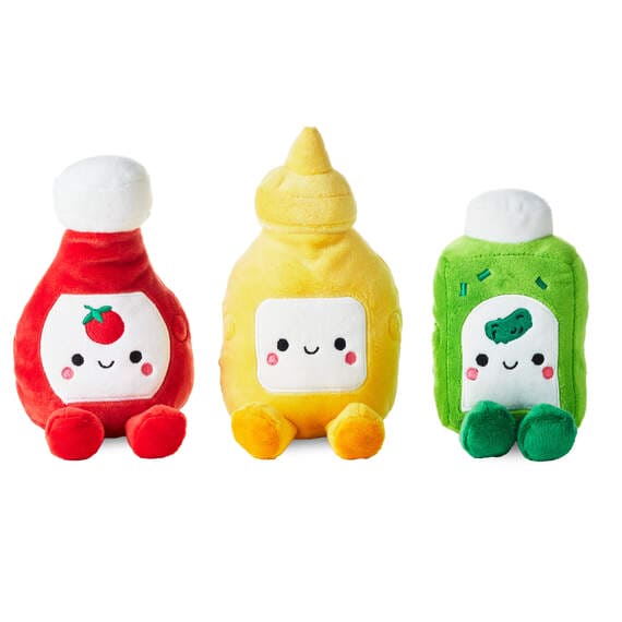 Better Together plush trio of ketchup, mustard, and relish bottles with embroidered details and magnetic connection.
