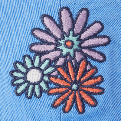 Cornflower blue cotton baseball cap with embroidered floral graphic and adjustable snap back.

