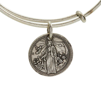 Silver bangle bracelet with a medallion of the Virgin Mary. 