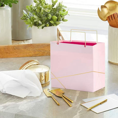 Hallmark small square gift bag in light pink with gold foil accents and gold metal handles, perfect for jewelry or small gift
