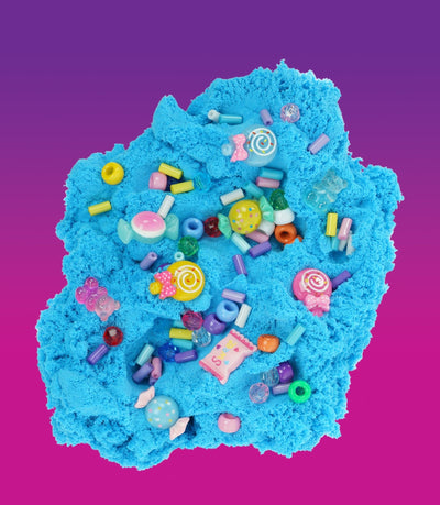 Fluffy blue slime with lollipop and candy-themed charms, offering a sweet, stretchy, and creative play experience.