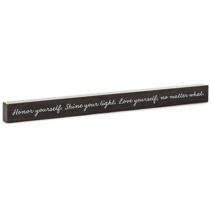 Hallmark black wood sign with white script reading “Honor yourself. Shine your light. Love yourself.”