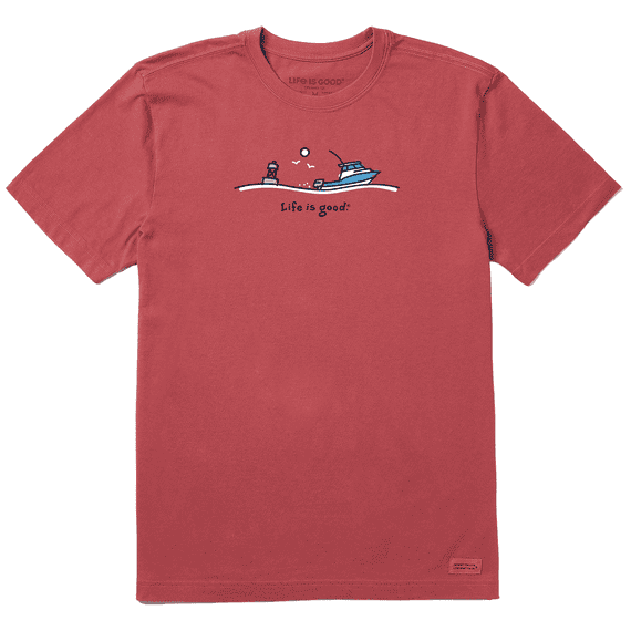 Men’s Crusher-LITE tee with a graphic of a small boat on the ocean, made from soft, lightweight cotton in a relaxed fit.

